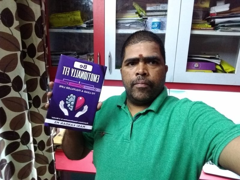 Community member with book